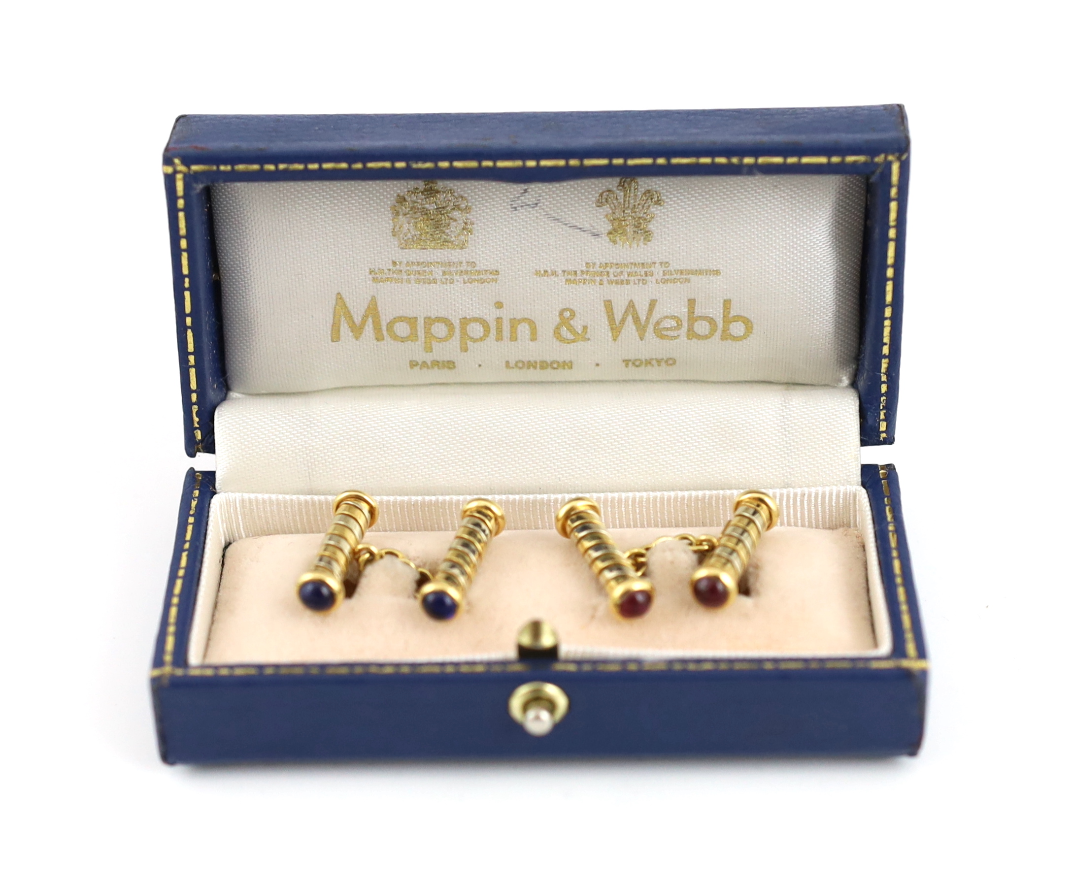 A pair of Italian Bulgari two colour 18ct gold and cabochon ruby and sapphire set baton cufflinks